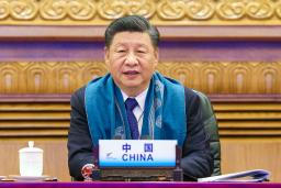 　１２日、オンライン形式で開かれたＡＰＥＣの首脳会議に臨む中国の習近平国家主席＝北京（新華社＝共同）