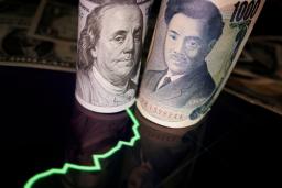 　米ドルと日本円の紙幣（ロイター＝共同）